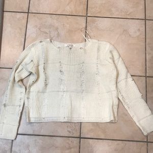 Ripped sweater